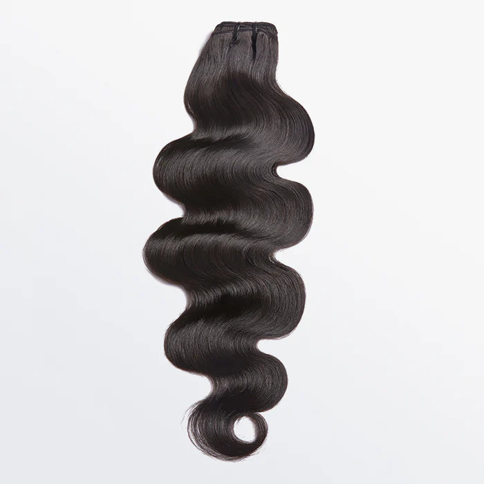 Raw Vietnam Hair Bundles in Body Wavy texture for soft, bouncy curls.
