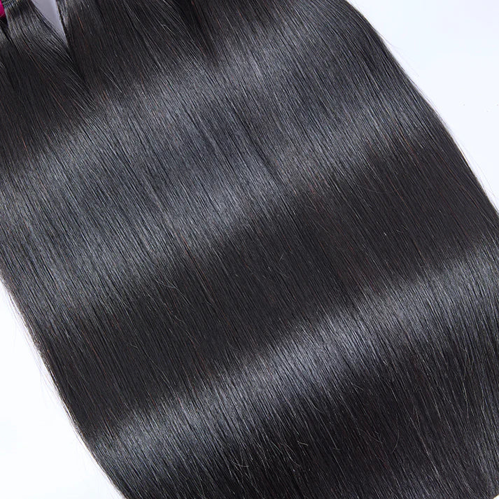 Raw Cambodian Bone Straight Hair Bundles held in hand, showcasing smooth, silky texture and high luster.