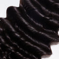 High-quality Raw Vietnam Deep Wavy Hair Bundles, perfect for styling.