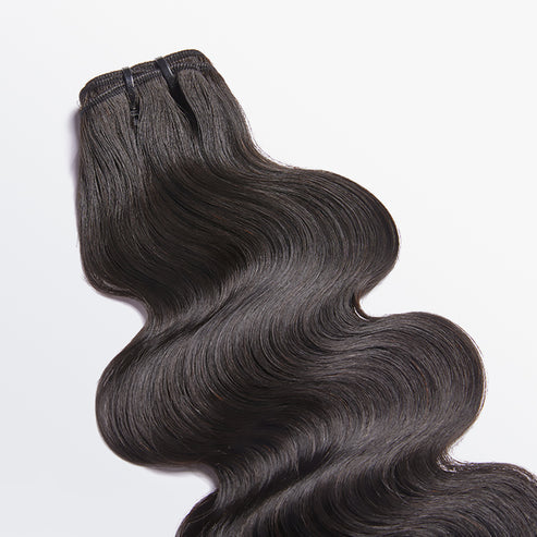 Experience natural elegance with Raw Vietnam Body Wavy Hair Bundles.