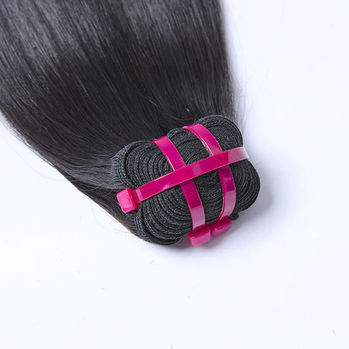 Raw Cambodian Bone Straight Hair Bundles displayed in a sleek, shiny appearance for high-quality hairstyles.